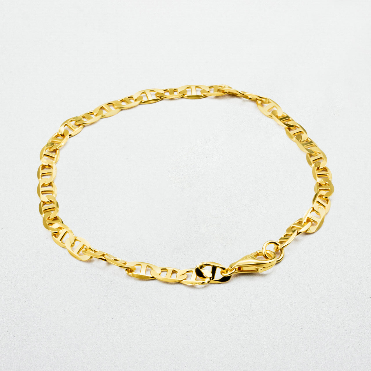 Showcasing Infinite Gold Bracelet on a white background