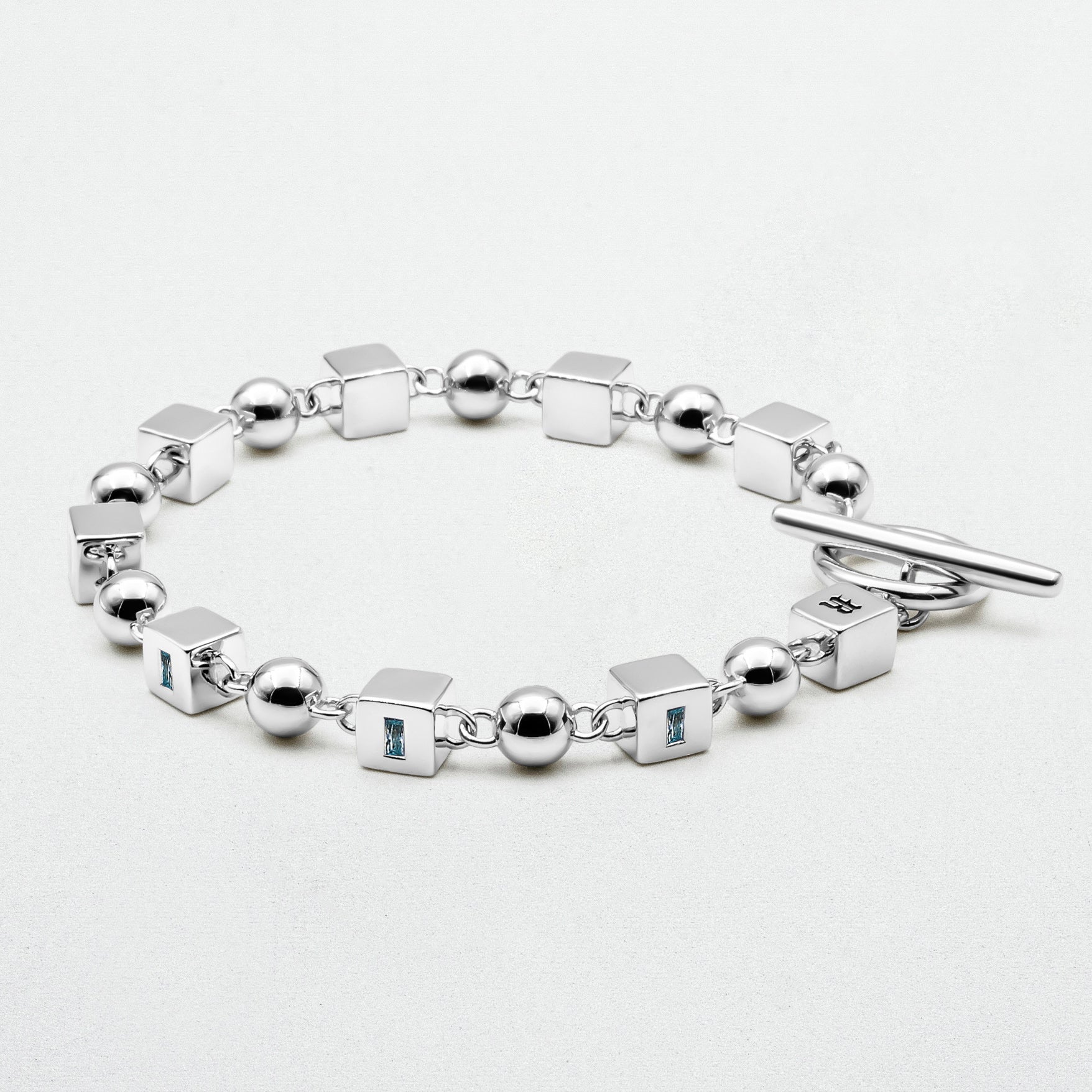 Showcasing Topaz Bracelet on white canvas