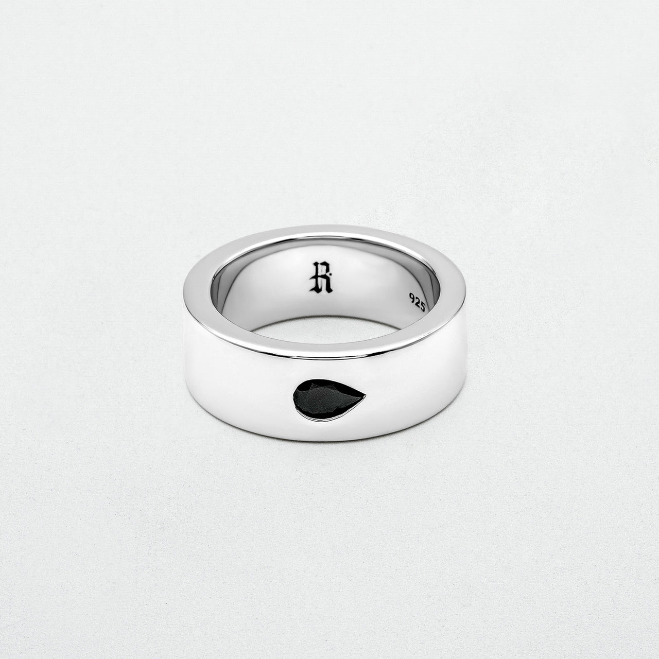 showcasing Teardrop Ring in a white canvas